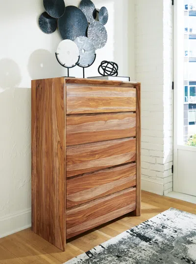 Ashley Dressonni 5 Drawer Chest Of Drawers In Brown