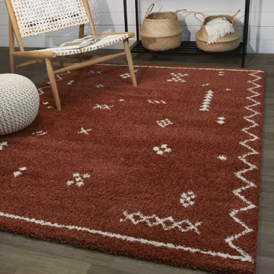 Ashley Eila Tribal Shag 7' 10" X 10' Area Rug In Brown