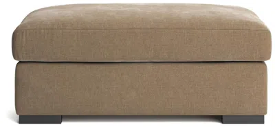 Ashley Luxe Calden Velvet Ottoman In Brown