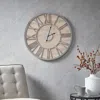 Ashley Mason Wall Clock In Brown