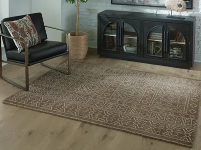 Ashley Merrittman 5' X 7' Area Rug In Brown