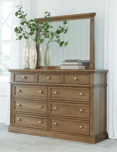 Ashley Mylarken 9 Drawer Dresser And Mirror In Brown