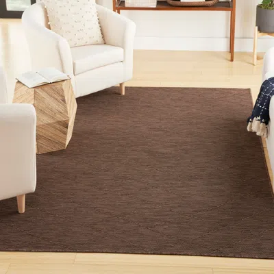 Ashley Nourison Home 7' X 10' Area Rug In Brown