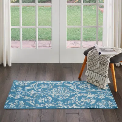 Ashley Nourison Home Jubilant 2' X 4' Accent Rug In Multi