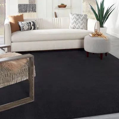 Ashley Nourison Home Outdoor Essentials 8' X 11' Area Rug In Black