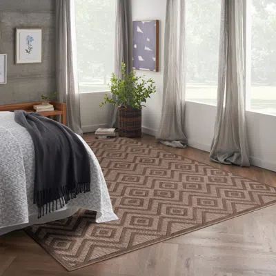 Ashley Nourison Home Versa Indoor/outdoor 9' X 12' Area Rug In Brown