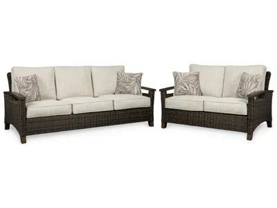 Ashley Paradise Trail Outdoor Sofa And Loveseat In Brown
