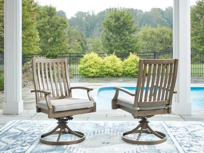 Ashley Rainier Ranch Outdoor Swivel Chair With Cushion (set Of 2) In Brown