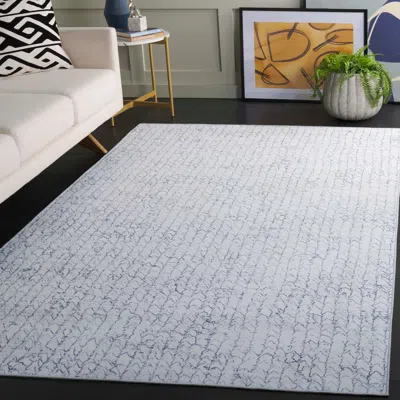 Ashley Safavieh Tacoma 5' X 8' Area Rug In Blue