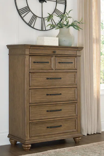 Ashley Waynely Chest Of Drawers In Brown
