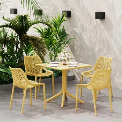 Ashley Westin Furniture Pearlina Solid Outdoor Dining Table In Yellow