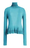 Ashlyn Merritt Sheer-hem Peplum Turtleneck In Blue