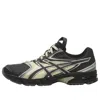 Asics Rounded Toe Sneakers With Grooved Sole And Sleek Finish In Black