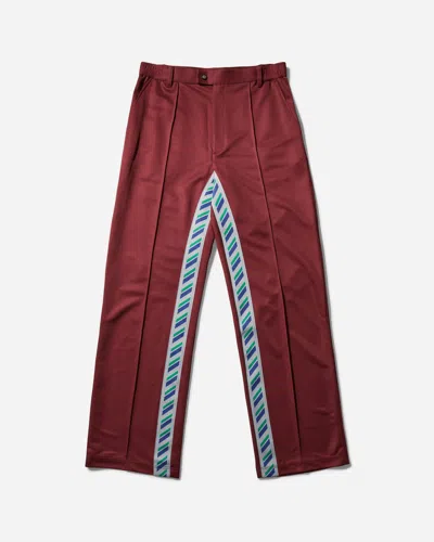 Asics Novalis Styrax Track Pants Dahlia In Red