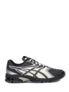 Asics Rounded Toe Sneakers With Grooved Sole And Sleek Finish In Gray