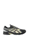 Asics Rounded Toe Sneakers With Grooved Sole And Sleek Finish In Gray