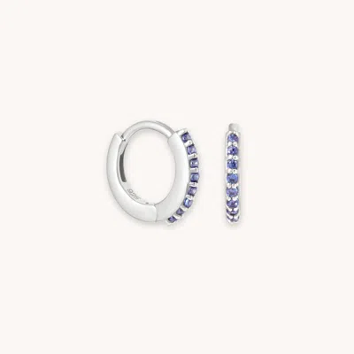 Astrid &amp; Miyu December Tanzanite Cz Birthstone Huggies In Silver In Metallic