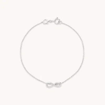 Astrid &amp; Miyu Infinite Charm Bracelet In Solid White Gold In Metallic