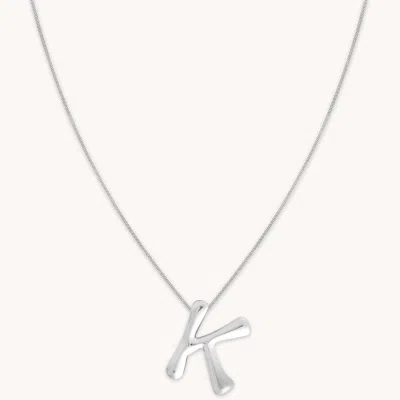 Astrid &amp; Miyu Initial Pendant Necklace K In Silver In Metallic