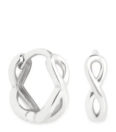 Astrid & Miyu White Gold Infinity Huggie Earrings In Silver