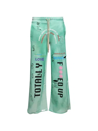 Astrum Distressed Graphic-print Track Pants In Green
