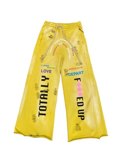 Astrum Distressed Wide-leg Track Pants In Yellow