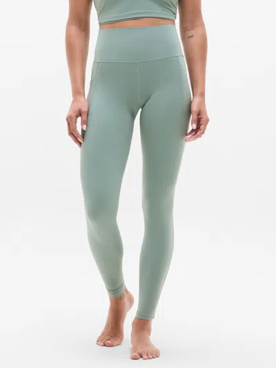 Athleta Salutation Stash High Rise Legging In Green