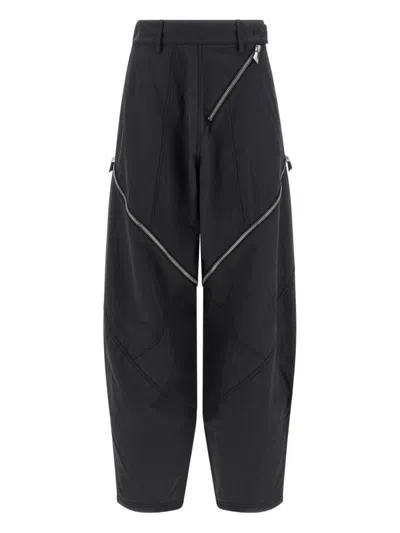 Attico Cropped Grey Trousers With Diagonal Zipper Accents In Black