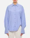 Attico All-over Logo Print Asymmetric Shirt In Clear Blue