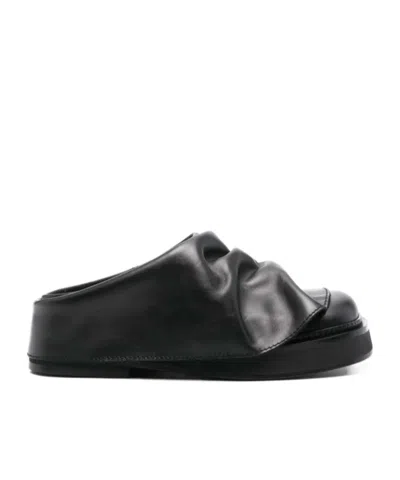 Attico Square Toe Muller Shoes In Black