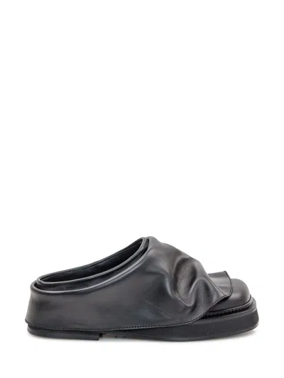 Attico Round Toe Leather Slip-on Sandals In Black