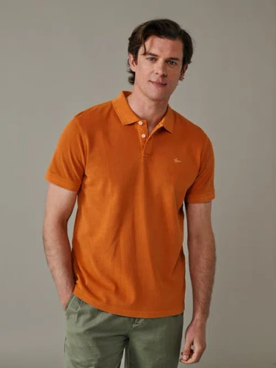 Aubin Lusby Short Sleeve Pique Polo Shirt In Orange