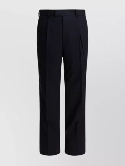 AURALEE TAILORED TROUSERS WITH PLEATS AND POCKETS