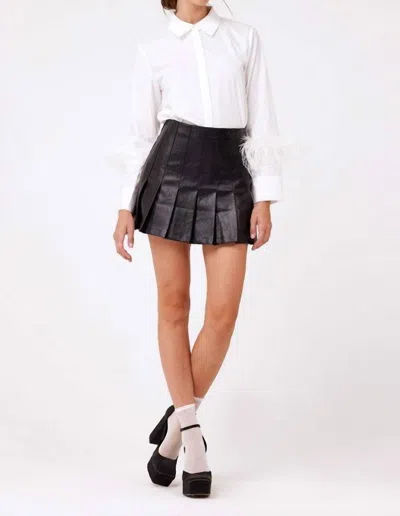 Aureum Pleated Leather Mini Skirt In Black In White