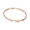 Autentica - Crystal Accent Hinged Bangle In Gold