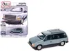 Autoworld 1987 Plymouth Voyager Van Ice Blue Metallic And Twilight Blue Metallic 2-tone With Blue Interior