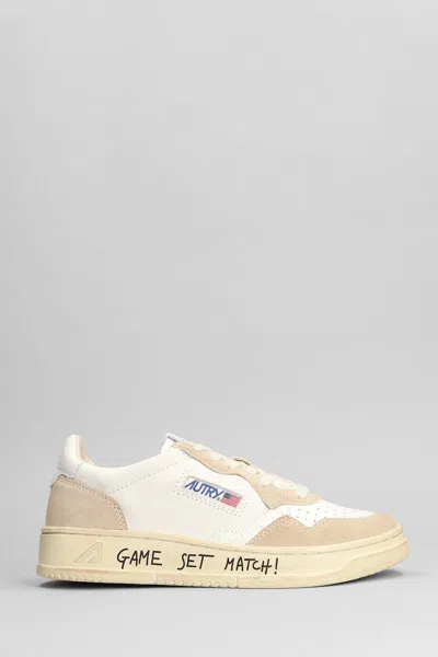 Autry Sneakers In White And Caramel Leather