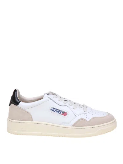 AUTRY BLACK AND WHITE LEATHER AND SUEDE SNEAKERS