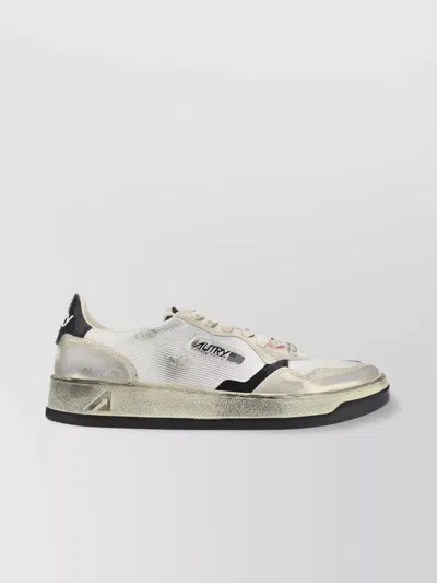 Autry Distressed Leather Low Top Sneakers In Cream