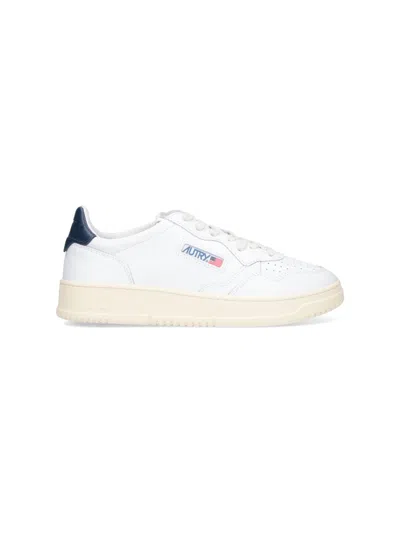 Autry Elevated Sneaker With Perforated Toe And Tonal Inserts In White