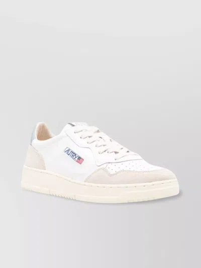 Autry Flat Sole Perforated Toe Sneakers In White