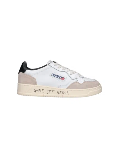 Autry Medalist Low Sneakers In White And Black Suede And Leather With Lettering In Multi