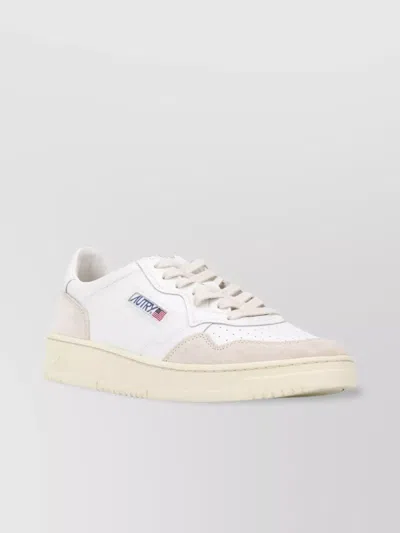 AUTRY LEATHER AND SUEDE SNEAKERS MICRO-HOLES