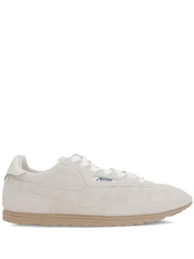 Autry Windspin Leather-trimmed Perforated Brushed Suede Sneakers In Beige