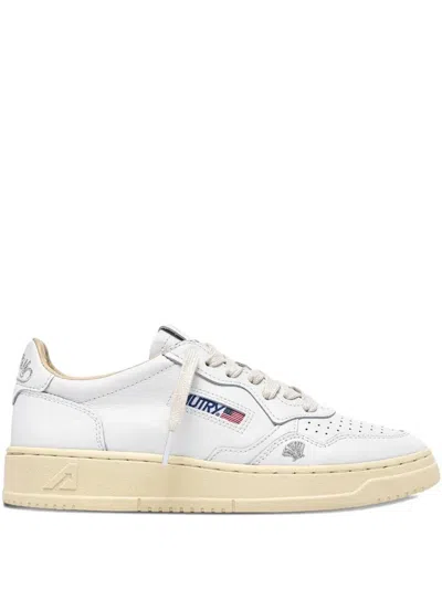 Autry Low-top Sneakers With Perforated Detailing And Metallic Accents In White