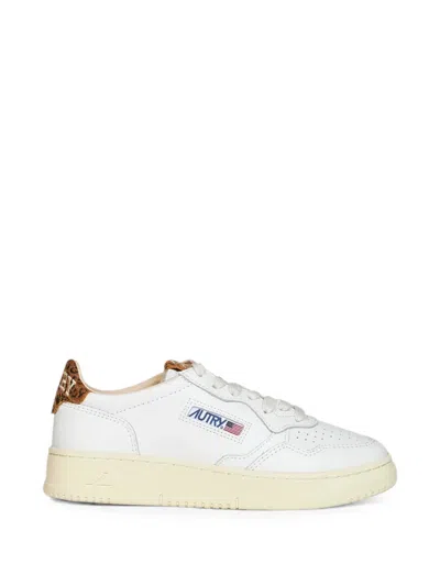Autry Low-top Leather Sneakers With Suede Heel Tab And Logo Accents In Neutral