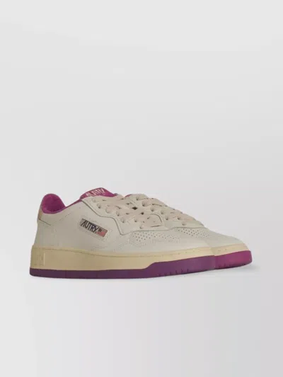 Autry Leather Sneakers With Contrast Sole And Perforated Toe Cap In Neutrals