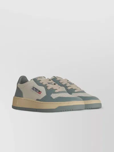 Autry Leather Sneakers With Rubber Sole And Perforated Toe In Metallic