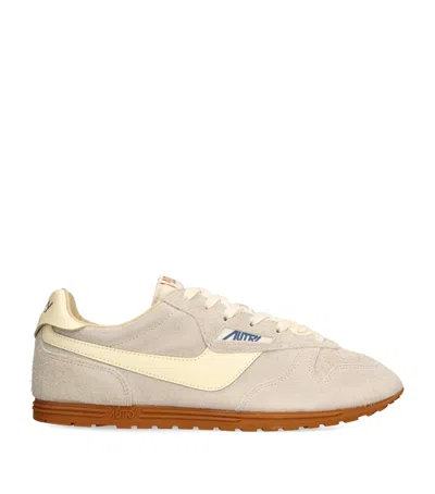 AUTRY LEATHER WINDSPIN LOW-TOP SNEAKERS