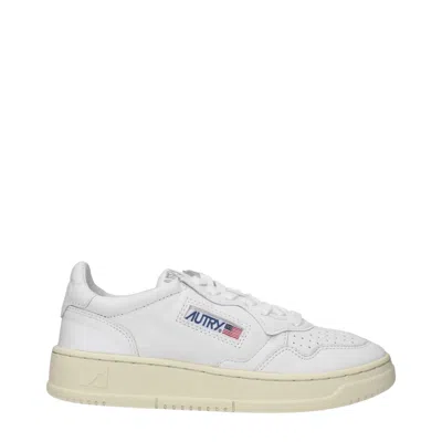 Autry Low-top Sneakers With Contrast Sole And Perforated Detailing In White